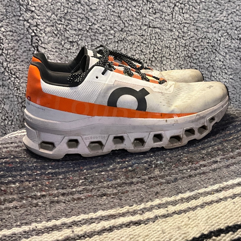 On Cloudmonster running shoes.  Men’s 9.5
